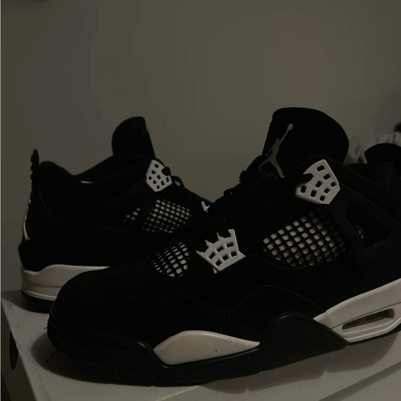 Jordan Black and White Air 4 Sneakers